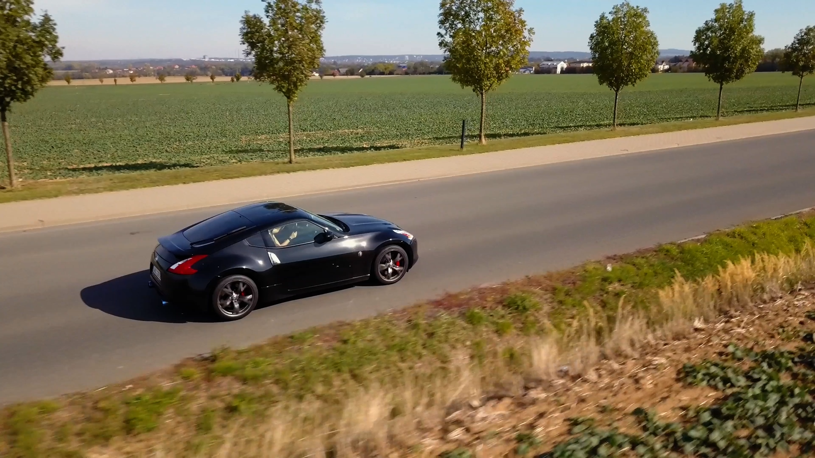 Black 370Z on the road