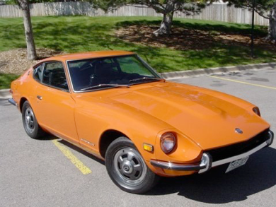 Orange Datsun 240Z, three-quarter front